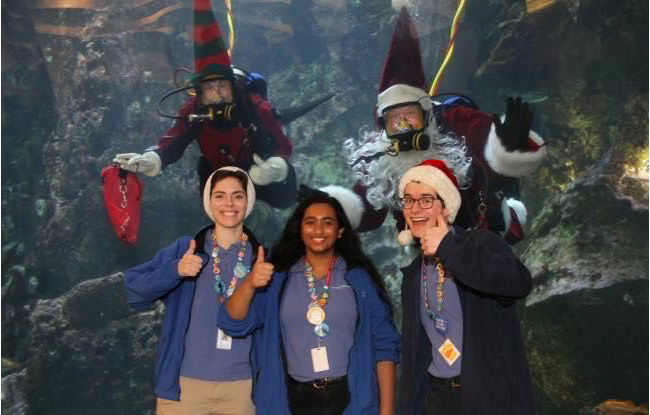 Pictured far right. Chris Cummings at a Seattle Aquarium event. 