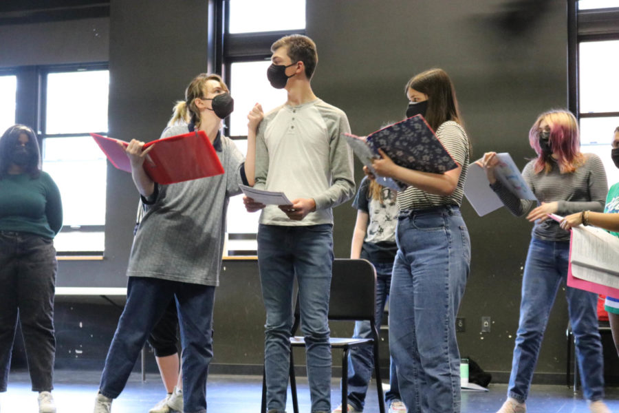 Left to right: Darby ONeill, Adam Call, and Jade Doerksen perform a scene