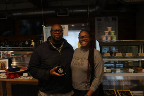 Black Coffee NW owners Erwin and DarNesha Weary inside their shop.